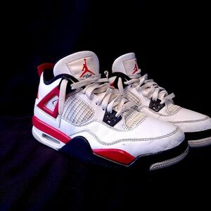 Selling a pair of Nike Jordan Red Cement shoes in used condition without a box.